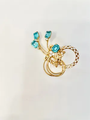 1960's divine gold brooch with emerald cut glass stones.... so classy!