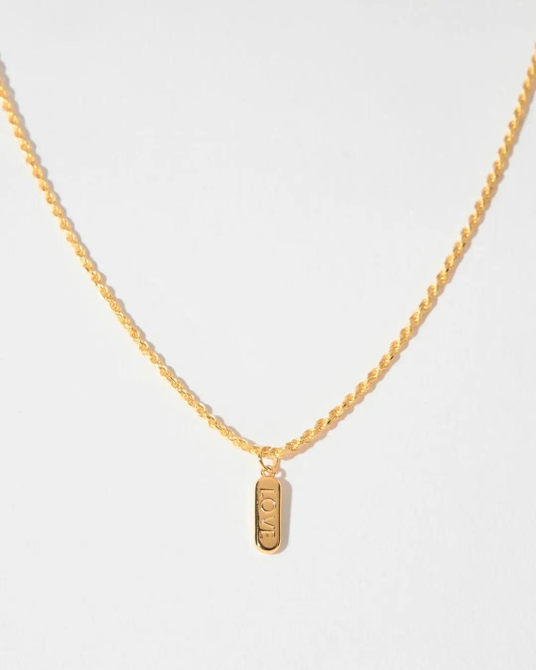 ENGRAVED LOVE PILL CHARM