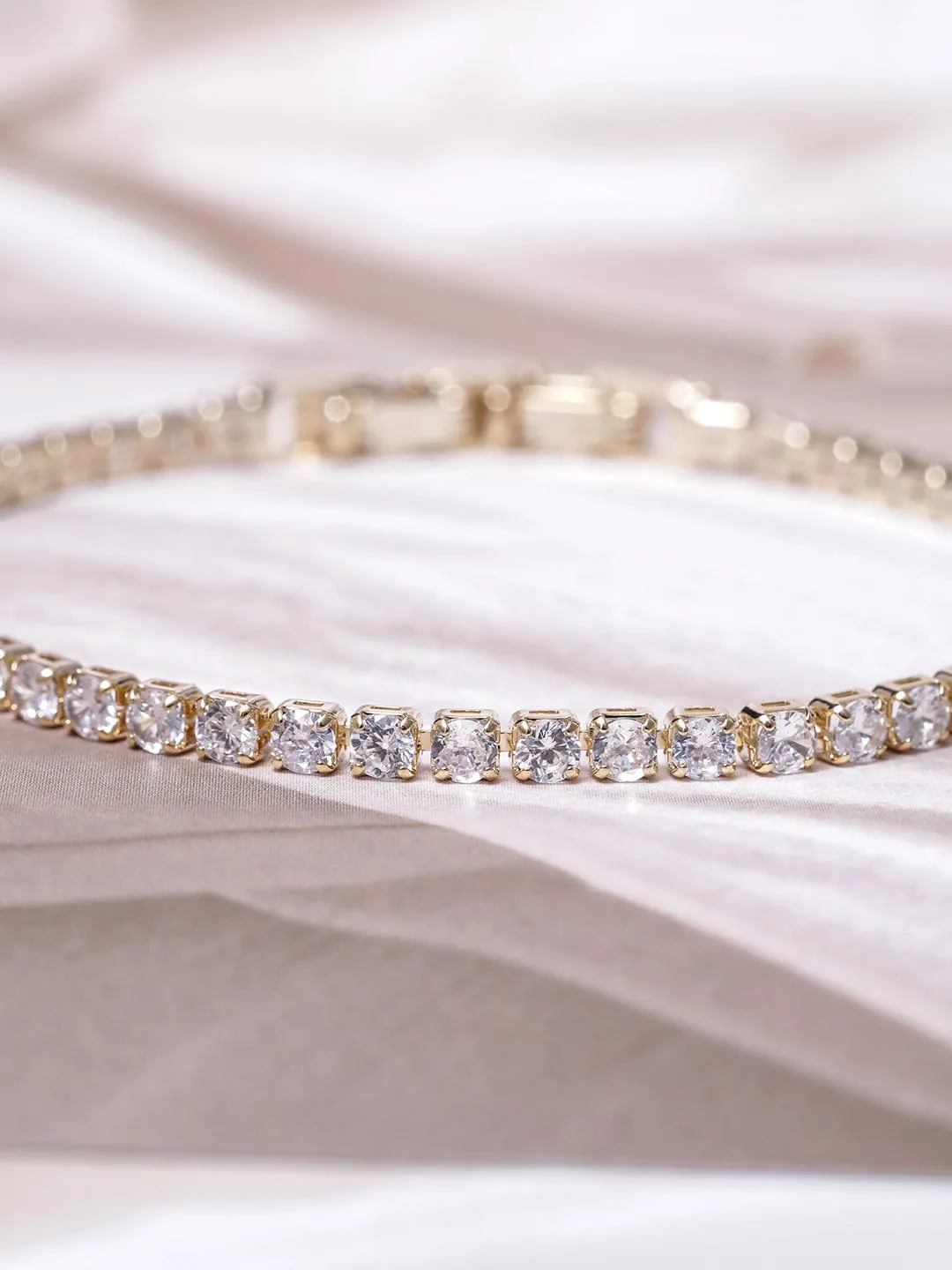 Voguish 22K Gold Plated AD & Cubic Zirconia Studded Delicate Tennis Bracelet